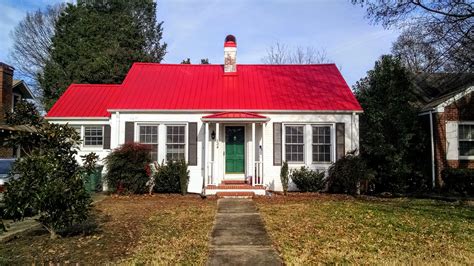 white brick house with red metal roof|metal roof on brick ranch.